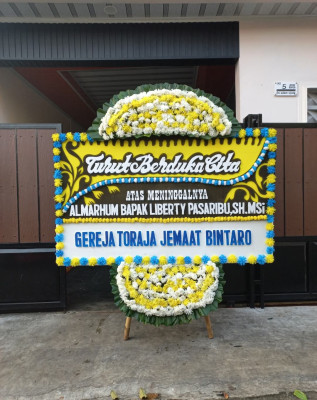 Papan Bunga Duka di Padang